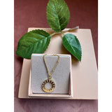 Guldbelagt halskæde med vedhæng