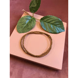 Friihof+Siig kobber farvet elastikarmbånd med guld perle