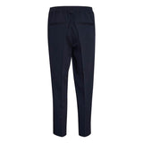 Marine blå bukser med pressefolder set bagfra