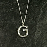 Halskæde med bogstav vedhæng