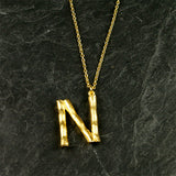 Halskæde med bogstav vedhæng