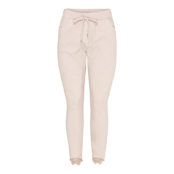 Beige joggings jeans med snøre i taljen og blonde detalje i buksebenene