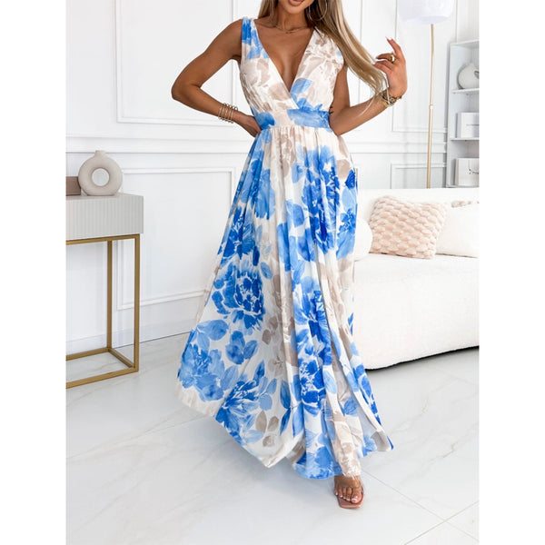 Lang fest kjole med blå og beige blomster og brede stropper