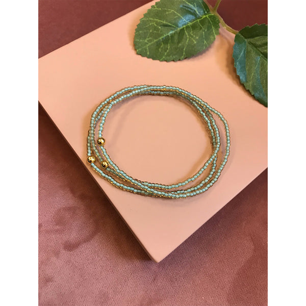 Friihof+Siig lysegrønt elastikarmbånd med guld perle
