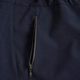 Mørkeblå bukser med lynlås