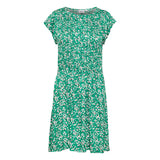 Grøn kjole med korte ærmer og overskæring i taljen printet er småblomstret set forfra